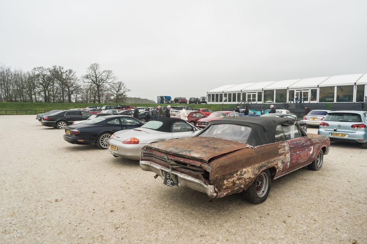 Chester, Cheshire, England, March 8th 2026. People are looking at a row of cars at the Chester Classic Car Auction.