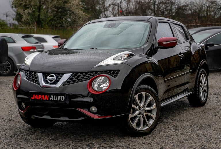 Black Nissan Juke with red accents side view