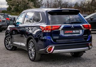 Dark blue Mitsubishi Outlander at dealership