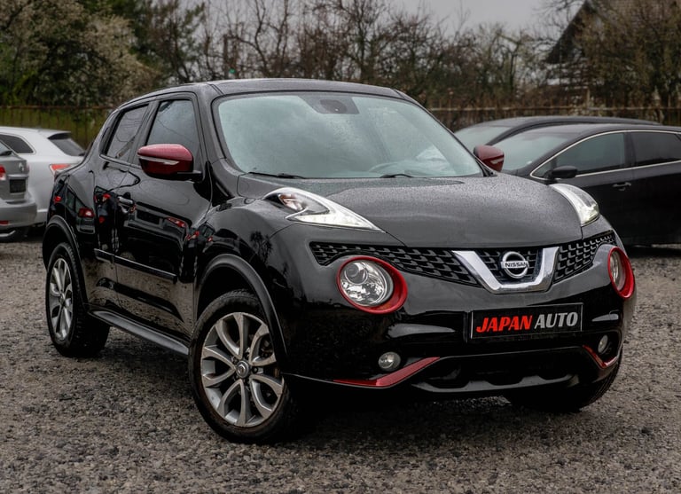 Black Nissan Juke with red accents
