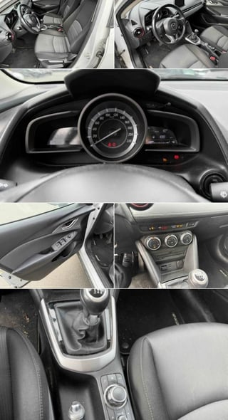 Composite view of car interior showing dashboard, steering wheel, seats, center console, and manual transmission shifter